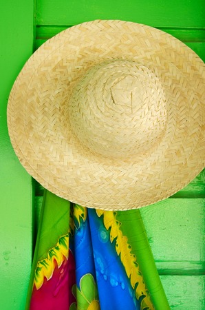Straw hats for sale in a tropical souvenir shop in Aitutaki Cook Islandsの写真素材