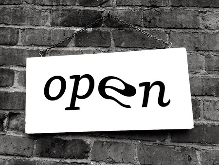 Open sign hang on an old brick wall.)_の写真素材