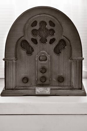 An old time classic radio on wooden shelf. (WB)の写真素材