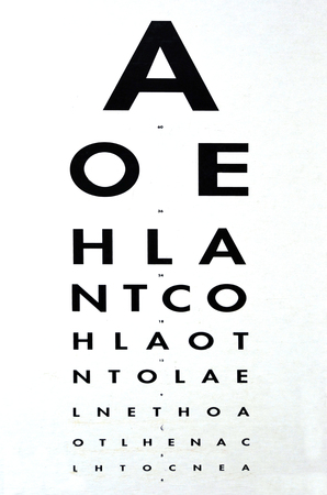 Eye examination - Traditional Snellen chart used for visual acuity testing. concept photo of health...