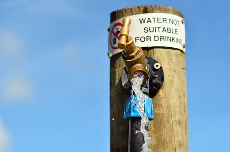 Water not suitable for drinking sign on outdoor  water tap. Horizontal. copy spaceの写真素材