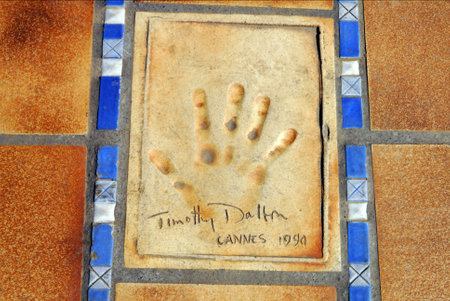 Handprints of movie and film stars (Timothy Dalton) in Cannes, France.のeditorial素材