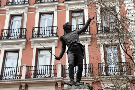 A male Statue Monument on a street in Madrid Spain.の写真素材