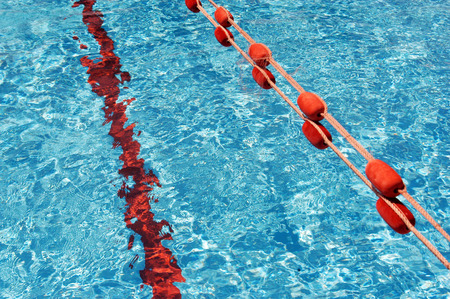 Swimming pool with empty lane.の写真素材