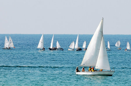 White sails boats at sea.のeditorial素材