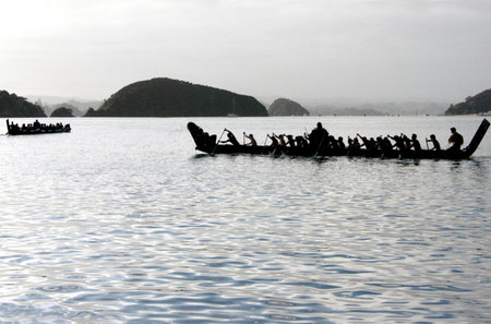 A traditional New Zealand Maori waka boat on the sea in the Bay of islands, New Zealand.のeditorial素材