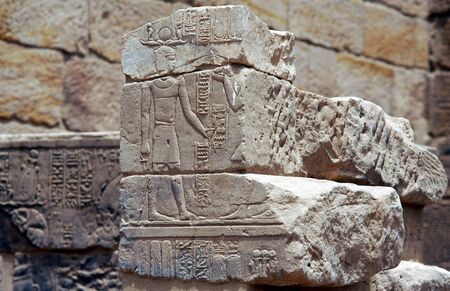 Ancient Egyptian artwork in Temple of Philae near Aswan, Egypt.の写真素材