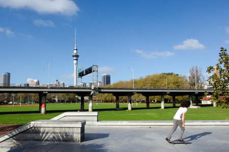 AUCKLAND - MAY 27:Young man skateboarding on May 27 2013 in Victoria Park.It's a famous park and sports ground in Auckland City, New Zealand.のeditorial素材