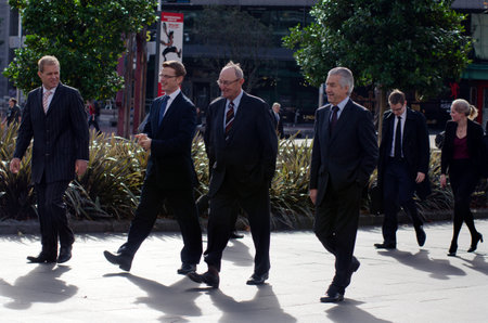 AUCKLAND, NZ - MAY 27:Businessmen on Queen Street on May 27 2013. 36% of NZ men working full-time worked 50 or more hours.のeditorial素材