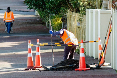 AUCKLAND, NZ - MAY 29:Roading Construction Workers on May 29 2013.According to U.S. Department of Transportation More than 20,000 workers are injured in road construction work zones each year.のeditorial素材