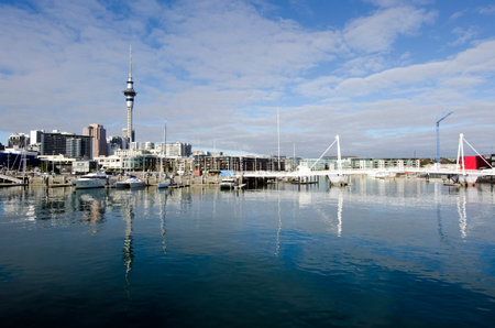 AUCKLAND - JUNE 02:Wynyard Crossing at Auckland Viaduct Harbor Basin on June 02 2013.It's a new double bascule walking  cycling bridge built in 2011 in Auckland, New Zealand.のeditorial素材