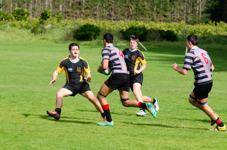 KAITAIA, NZ - AUG 03: People plays Rugby on Aug 03 2013.Rugby union is the unofficial national sport of NZ. The national team, the All Blacks, rank as the top international team in the world.のeditorial素材