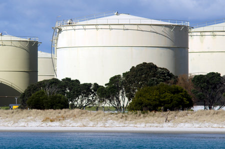WHANGAREI,NZ - JULY 28:Oil tanks in Marsden Point Oil Refinery on July 28 2013.It's produces 70% of NZ refined oil needs, with the rest being imported from Singapore, Australia and South Koreaのeditorial素材