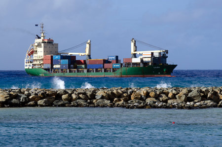 RAROTONGA - SEP 16: Large cargo ship from New Zealand arrive to Port of Avatiu in Rarotonga on Sep 16 2013.It's the international port of Cook Island, which handles 90 imports by sea.のeditorial素材