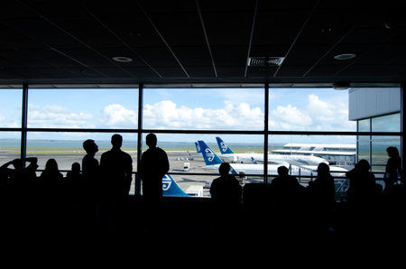 AUCKLAND - SEP 15:Passengers at Auckland International Airport on Sep 15 2013.It's the largest and busiest airport in New Zealand with 14,006,122 passengers in 2011のeditorial素材