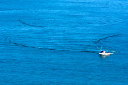 MANGONUIE, NZ - JAN 04:Fishing boat on Jan 04 2014.NZ exclusive economic zone covers 4.1 million km2,It's the 6th largest zone in the world and 14 times the size of NZ.のeditorial素材