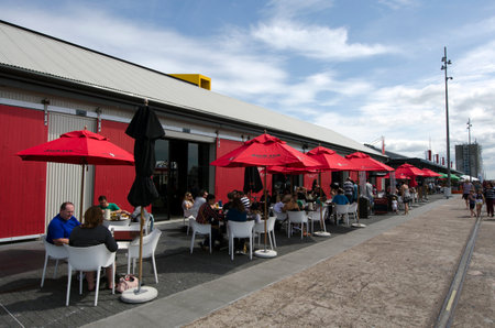AUCKLAND - OCT 06:Restaurants and cafe at Auckland Viaduct Harbor Basin on Oct 06 2013.It's a former commercial harbor turned into a development of upscale apartments, office space and restaurants.のeditorial素材