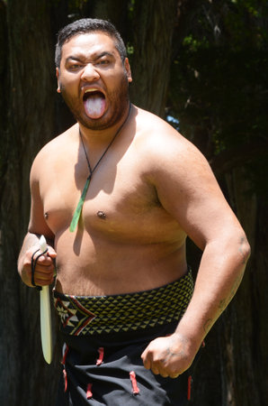 WAITANGI, NZ - FEB 06:Maori man preforming haka during Waitangi Day on February 6 2014 in Waitangi NZ.It's a New Zealand public holiday to celebrate the signing of the Treaty of Waitangi in 1840.のeditorial素材
