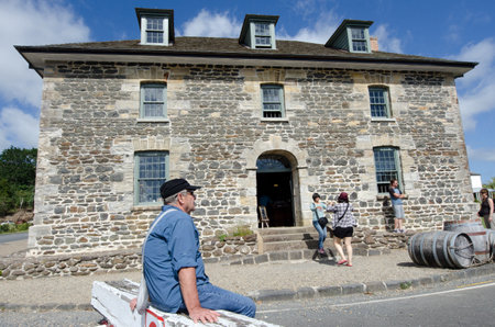 KERIKERI, NZ - JAN 07:Visitors at Kerikeri stone store  on Jan 07 2014.It is the oldest stone building in New Zealand.のeditorial素材