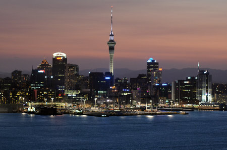 AUCKLAND, NZ - JAN 18:Auckland downtown skyline during sunset on Jan 18 2014.Auckland has been rated one of the world's top 10 cities to visit by travel bible Lonely Planet.のeditorial素材