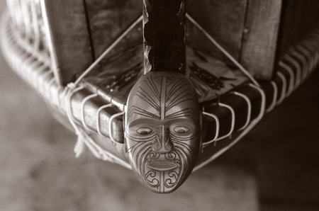 WAITANGI - JAN 07: Wood curving decoration on the 35 metre Maori Waka (war canoe) on Jan 07 2014 in Waitangi National Reserve, Bay of Islands, Far North District, Northland Region, New Zealand (NZ). (BW)のeditorial素材