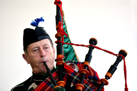 AUCKLAND,NZ - JUNE 01 2014:Bagpipe player celebrate the Queen's Birthday on the first Monday of June each year as the Queen of the United Kingdom being the head of state.のeditorial素材