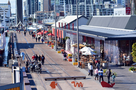 AUCKLAND - JUNE 01 2014:Visitors in Auckland Wynyard Quarter. Auckland has been rated one of the world's top 10 cities to visit by travel bible Lonely Planet.のeditorial素材