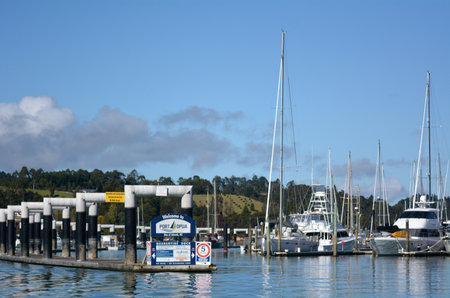 OPUA, NZ - MAY 11 2014:Opua marina entrance. It's New Zealand's northernmost port of entry for overseas vessels and a Customs and Ministry of Agriculture and Fisheries (MAF) Place of First Arrival.のeditorial素材