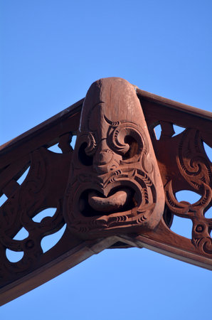 AUCKLAND - JUNE 01 2014:Wood curving figure of a Maori male.Maori are the indigenous people of New Zealand. Originally from Polynesia, Maori migrated to New Zealand over 1000 years ago.のeditorial素材
