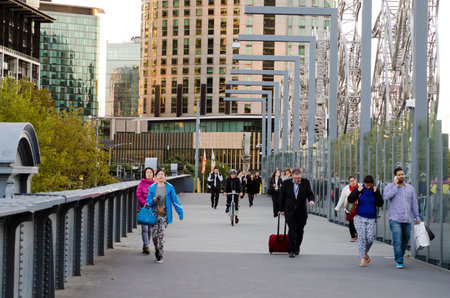 MELBOURNE,AUS - APR 14 2014:Pedestrian cross Sandridge Bridge.It's an historic former railway bridge from the Victorian era and today it's a popular pedestrian and cycle path featuring public art.のeditorial素材