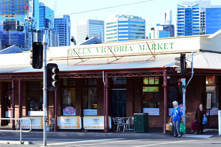 MELBOURNE, AUS - APR 12 2014:Shoppers outside   Queen Victoria Market. It is a major landmark and the largest open air market in the Southern Hemisphere.のeditorial素材