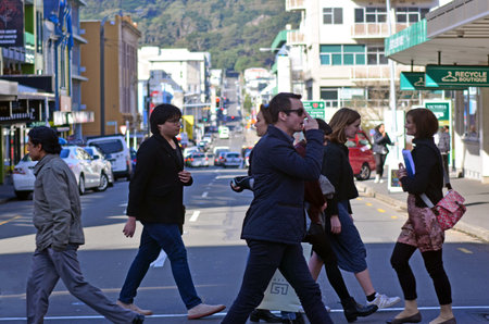 WELLINGTON - AUG 22 2014:Wellingtonian people cross a road in Wellington. It's New Zealand's centre of culture and the world's southernmost capital city.のeditorial素材