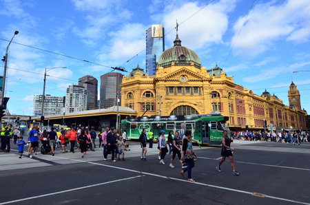 MELBOURNE, AUS - APR 13 2014:Traffic outside Flinders Street Station.It is the busiest station on Melbourne's metropolitan network, with some 92.6 million passenger movements recorded in 2011/12のeditorial素材