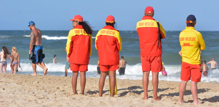 GOLD COAST, AUS - NOV 0 2014: Australian Lifeguards in Gold Coast Australia.Australian Lifeguards are world-renown for their high levels of skill and knowledge in accident prevention and rescue responseのeditorial素材