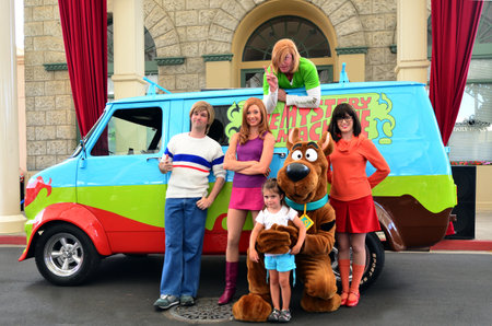 GOLD COAST, AUS -  NOV 06 2014:Little girl (Talya Ben-Ari age 04) with Scooby-Doo team Movie World Gold Coast Australia.The film  was a successful release with box office gross of over US$130 million.のeditorial素材