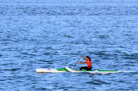 GOLD COAST - OCT 08 2014:Australian woman sea kayaking.It's a very popular sport in the waterway of the Gold Coast in Queensland, Australia.のeditorial素材