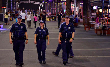 GOLD COAST, AUS - OCT 28 2014:Police officers patrols in Surfers Paradise. Gold Coast police on high terror alert warned to be hyper vigilant and patrol local mosques and critical infrastructure sitesのeditorial素材