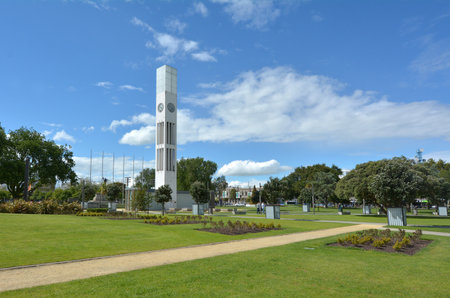 PALMERSTON NORTH, NZL - DEC 01 2014:Palmerston North Square.It contains the city clock tower, war memorial and a memorial dedicated to the Maori chief that sold the district to NZL government in 1865.のeditorial素材