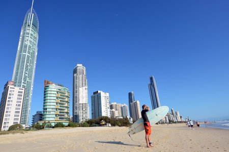 SURFERS PARADISE - NOV 14 2014:Surfer checking the waves in Surfers Paradise.It one of Australia's iconic coastal tourist destinations, drawing millions of surfers from all over the world.のeditorial素材