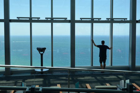 SURFERS PARADISE - NOV 14 2014:Visitor in Skypoint observation deck.It located 230 metres 750 ft off the ground at the top of the Q1 on the Gold Coast, Australia.のeditorial素材