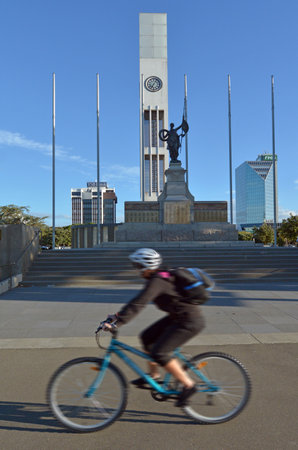 PALMERSTON NORTH, NZL - DEC 01 2014:Palmerston North Square.It contains the city clock tower, war memorial and a memorial dedicated to the Maori chief that sold the district to NZL government in 1865.のeditorial素材