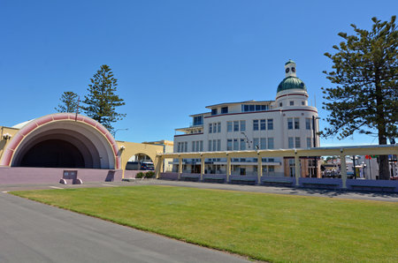 NAPIER, NZL - DEC 03 2014:Sound Shell and T  G Building.Napier is a popular tourist city with a unique 1930s Art Deco architecture, built after the city was razed in the 1931 Hawke's Bay earthquake.のeditorial素材