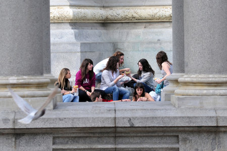 Spanish youth and teenagers having fun in Retiro Park Parque del Retiro in Madrid, Spain.のeditorial素材