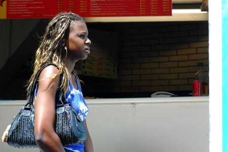MARSEILLE - MAY 10:Young African woman in the street on May 10 2008 in Marseille,France.Marseille is France's largest city on the Mediterranean coast and largest commercial port.のeditorial素材