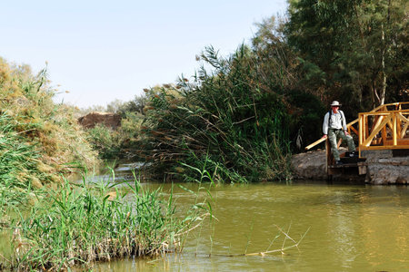 JERICHO, ISRAEL - DEC 14: Pilgrim in Qasr el Yahud on December 14 2008.According to tradition it's the place where the Israelites crossed the Jordan River and where the baptism of Jesus took place.のeditorial素材