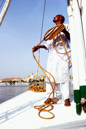 ASWAN - APRIL 28: A Felucca sail over the river Nile in Aswan, Egypt on April 28 2007.The feluccas...