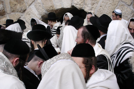 JERUSALEM - APRIL 07: Orthodox Jewish Pray at the Western Wall during the Jewish holiday of Passover...