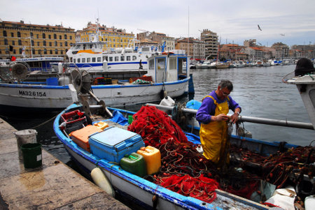 MARSEILLE - MAY 09:Fishing boat at Vieux-Port on May 09 2008 in Marseille,France.Marseille is France's largest city on the Mediterranean coast and largest commercial port.のeditorial素材