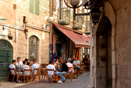 JERUSALEM - AUG 17:Young Israeli people in a cafe in Nahalat Shiva on Oct 17 2007.Jerusalem has been the holiest city in Jewish tradition since King David of Israel first established in 1000 BCE.のeditorial素材