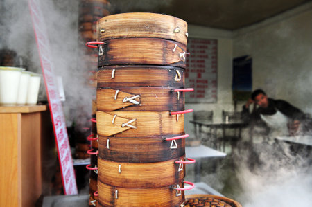 BEIJING - MARCH 12:Chinese dish jiaozi - momo in a restaurant on March 12 in Beijing, China.Millions of Chinese people eat street food every daのeditorial素材